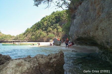 Papaya Island a.k.a. Roxas Island. One of the farthest islands from Lucap (6.5 km). It is located on the outskirts of the island cluster several hundred meters northeast of the more popular Quezon Island.
Photo by:: CACriss (2003)