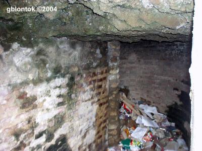The remnants of the ancient tunnel with corresponding modern day garbage.
Photo by:: GBLontok (2004)
